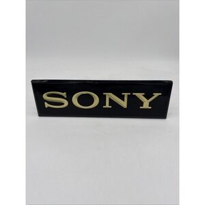 Vintage Black W/ Gold Lettering Metal Sony Logo Countertop Sign Approx 14x4